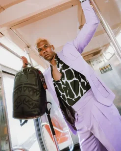 AFRICAN INTELLIGENCE 9 APEX GENIUS BACKPACK - SANDFLOWER COLLAB><noscript><img width=