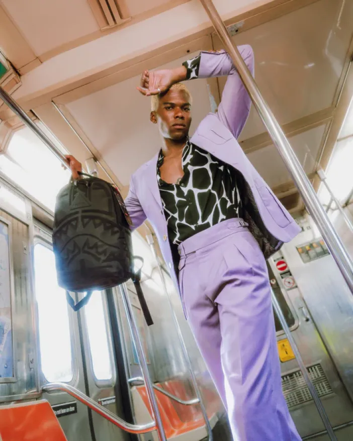 AFRICAN INTELLIGENCE 9 APEX GENIUS BACKPACK - SANDFLOWER COLLAB>SPRAYGROUND New