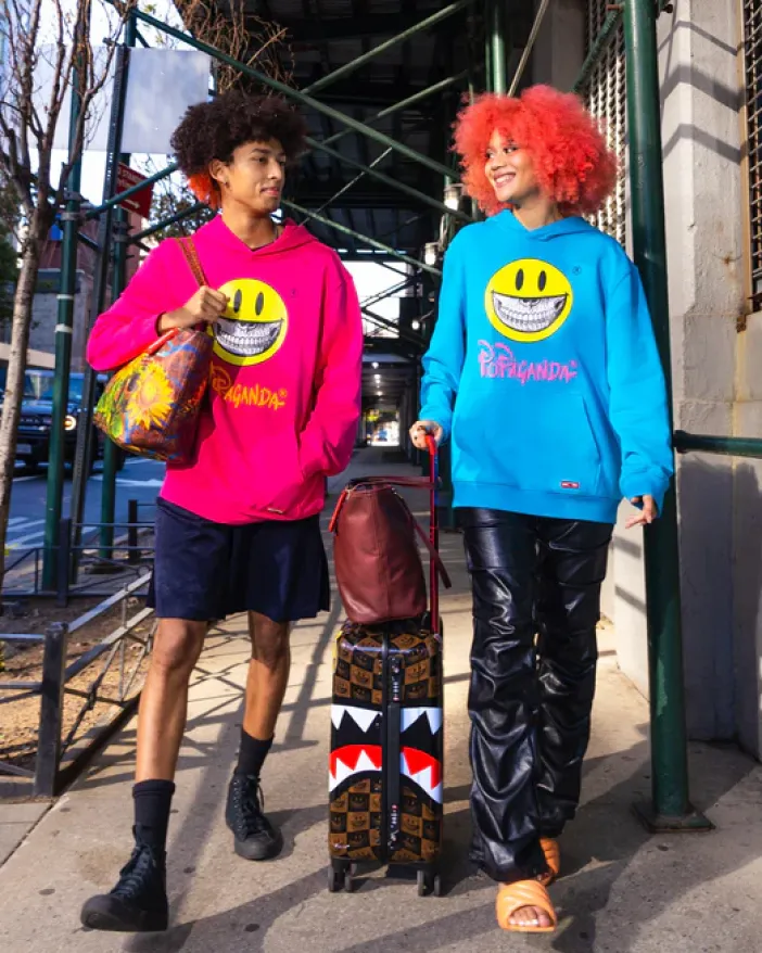 SUNFLOWER GRIN RON ENGLISH COLLAB TOTE>SPRAYGROUND New