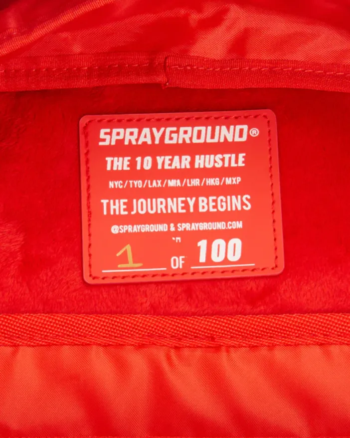 THE 10 YEAR HUSTLE BACKPACK. MYSTERY BOX. NUMBERED 1 OF 100>SPRAYGROUND Discount